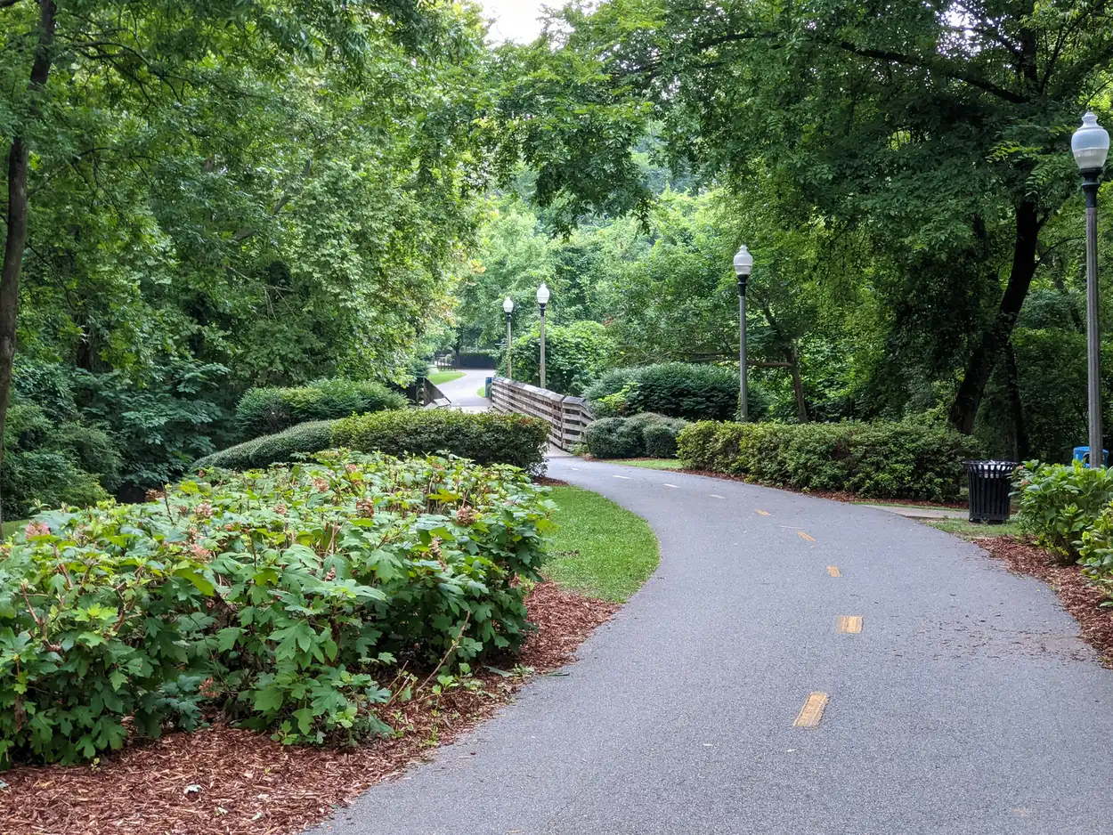 The Riverwalk path beside Jack Warner Parkway along the Black Warrior River on the north edge of downtown Tuscaloosa.