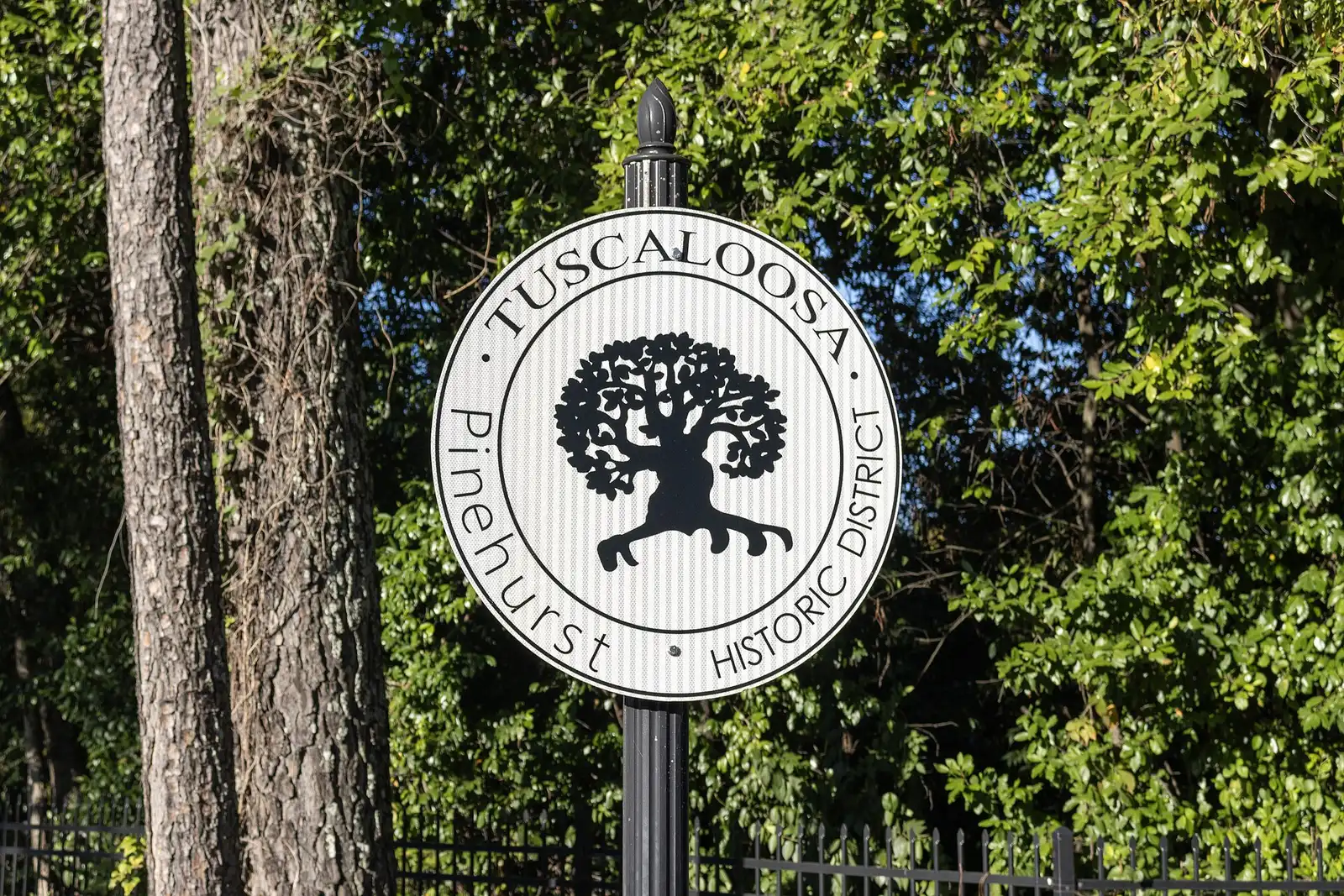 A Pinehurst Historic District sign, one of the city's local historic district markers, on a street near the University of Alabama in Tuscaloosa.