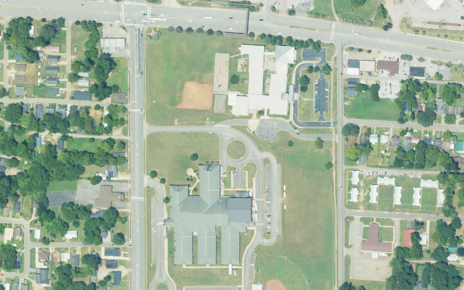 Central Elementary School, top, and Westlawn Middle School, bottom, side by side in west Tuscaloosa, seen from the air in 2023