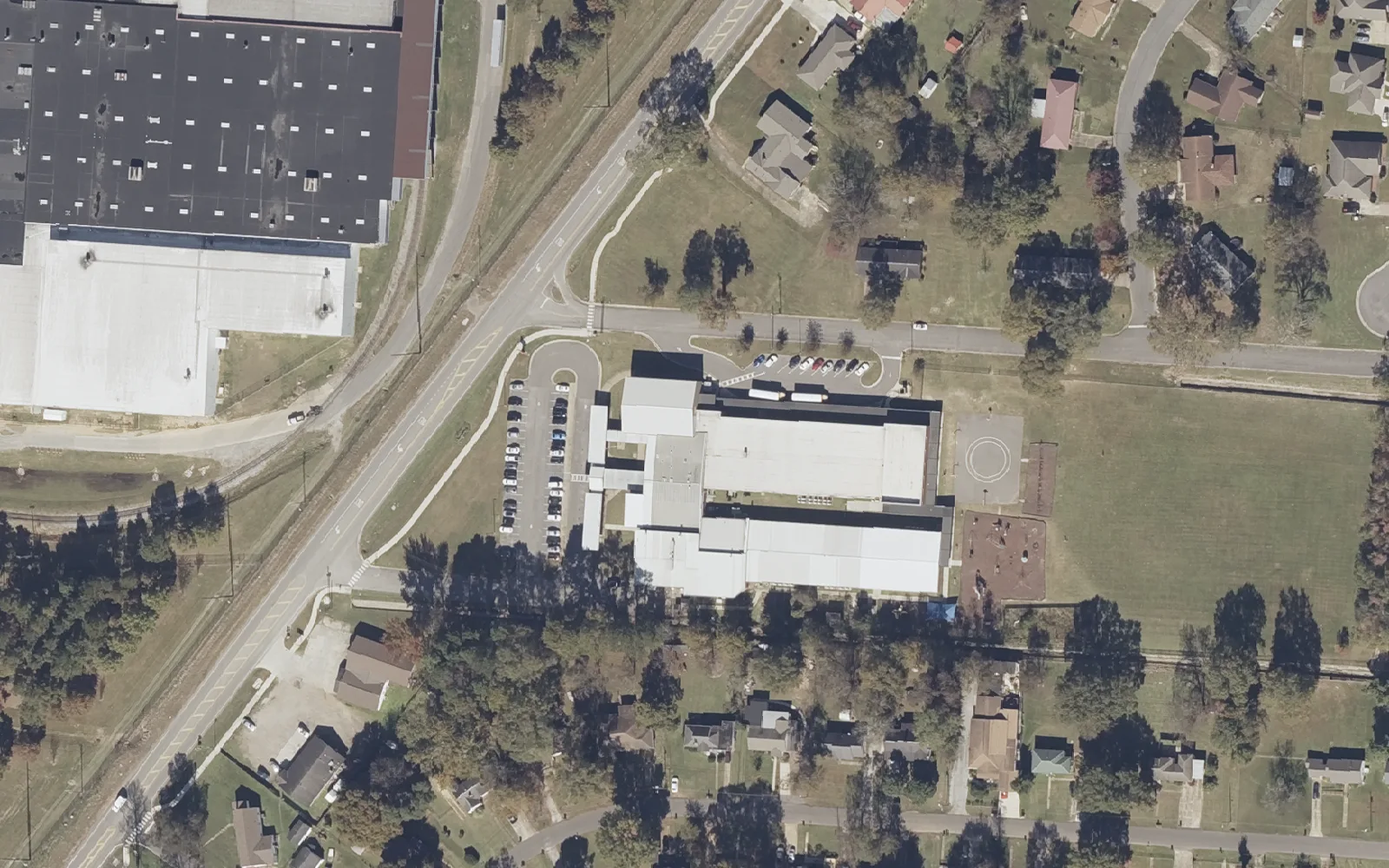 Oakdale Elementary School, right of center, on 25th Street in west Tuscaloosa, seen from the air in 2021