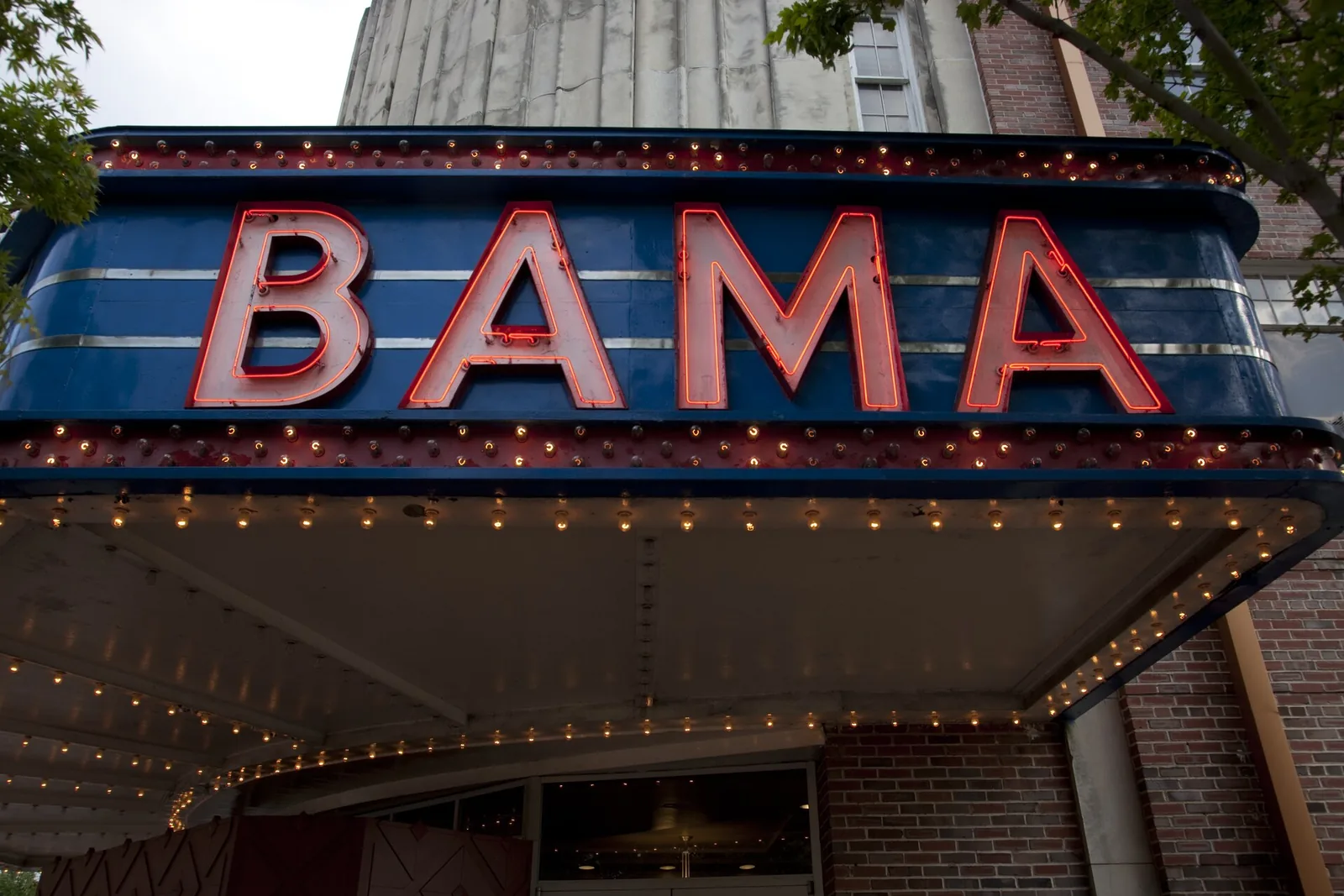 The neon marquee of the Historic Bama Theatre on Greensboro Avenue in downtown Tuscaloosa, run by the Arts Council of Tuscaloosa.