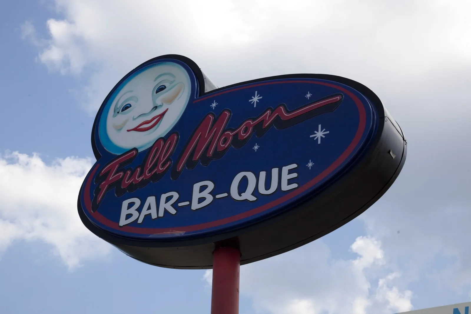 The Full Moon Bar-B-Que sign in Tuscaloosa, photographed by Carol M. Highsmith.
